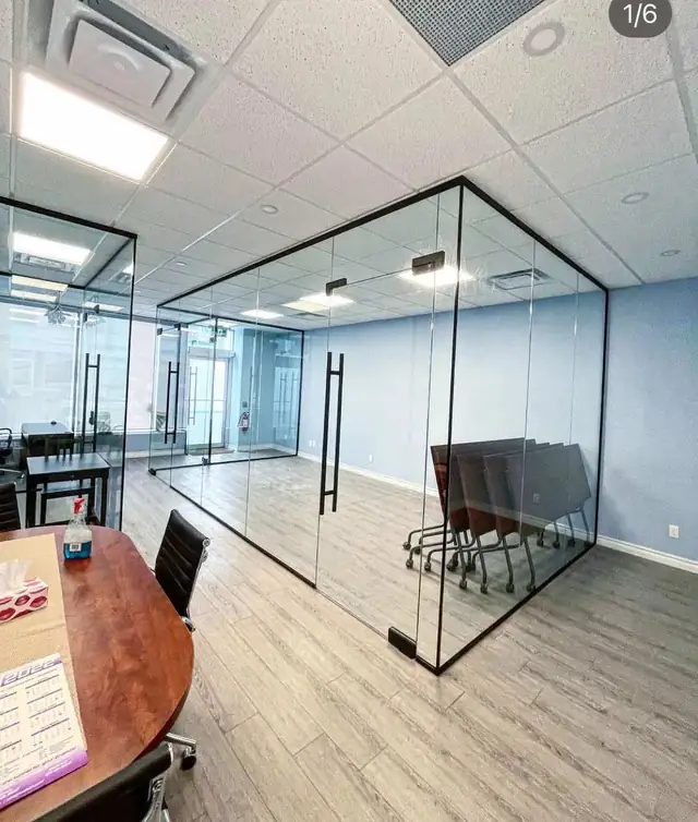 Office with newly installed glass partition walls and doors